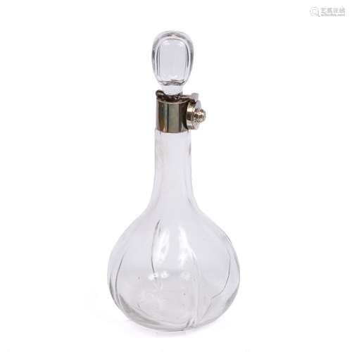 Plain glass decanter of bulbous form with neck mounted locking mechanism (lacks key)