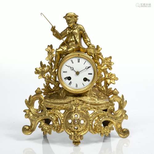 French gilt metal mantel clock with striking movement under a glass dome, 33cm high