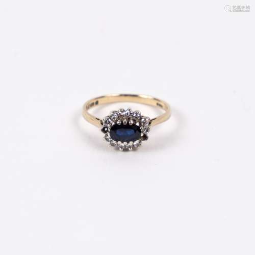 9ct gold ring with sapphire and diamond chip setting (some stones missing)