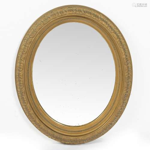 Oval gilt wall mirror with carved leaf border, 63cm x 56cm