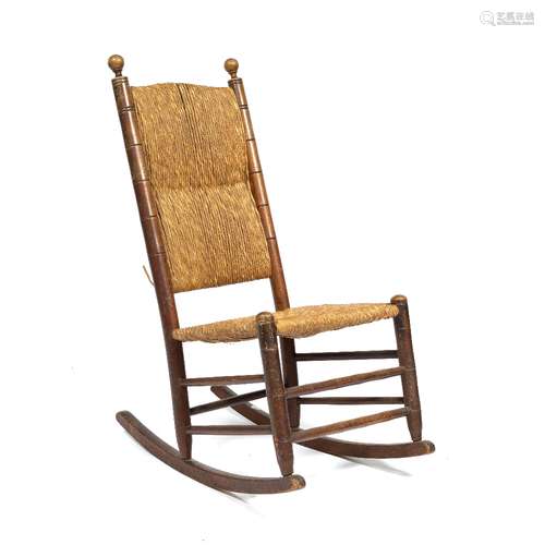 Fruitwood and rush rocking chair 45cm across x 100cm high