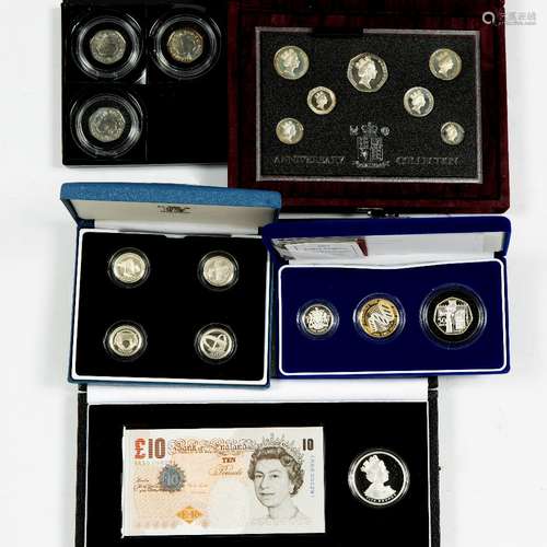 Collection of coins (cased) including Jubilee £10 note and £5 coin set, 1996 anniversary set, London