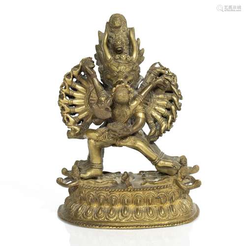 Tibetan bronze model of Yamantaka on a double lotus base, 21cm high