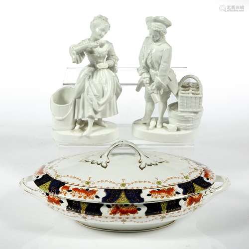 Pair of continental white glaze figures 21cm and a pottery oval tureen