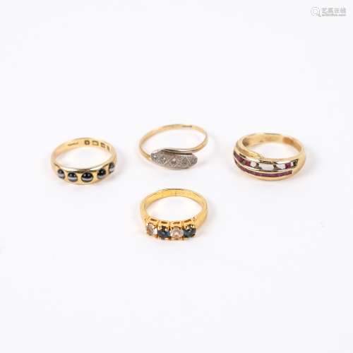 Four gold and other rings with various settings