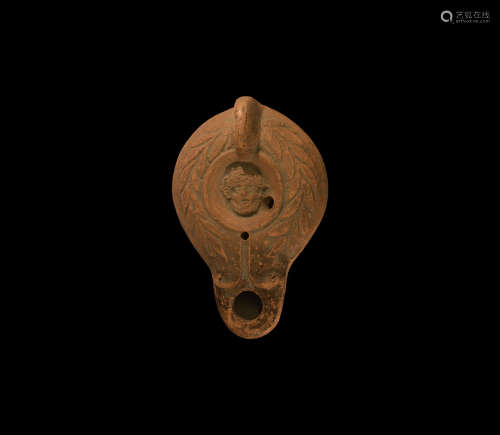 Roman Oil Lamp with Hercules Mask