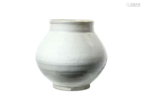 A CREAM POTTERY JAR. Possibly Korean, 20th Century. With a compressed ovoid body and a cylindrical