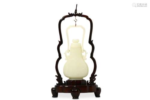 A CHINESE WHITE JADE HANGING BASKET AND COVER. Of flattened pear-shaped form, incised with