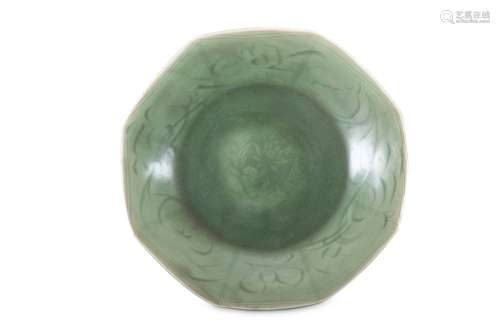 A CHINESE OCTAGONAL LONGQUAN CELADON DISH.  Ming Dynasty. Incised to the centre with a lotus