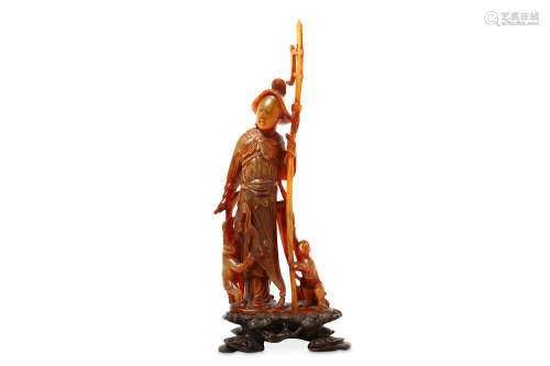 A CHINESE HORN 'WARRIOR' CARVING. Qing Dynasty. Standing, wearing a ceremonial armour with a