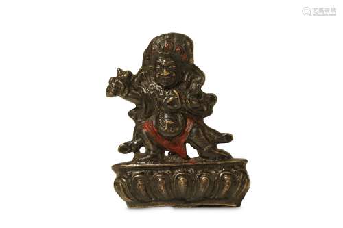 A TIBETAN BRONZE FIGURE OF BEGTSE CHEN. 19th Century. The deity standing in a dynamic pose on a