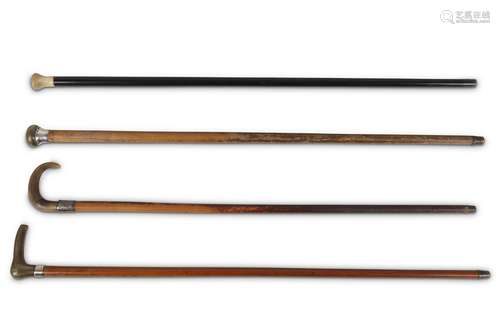 FOUR WALKING STICKS WITH RHINOCEROS HORN HANDLE. Circa 1900. 85-89cm long. (4) 約一九零零   鑲犀角把手拐杖四只