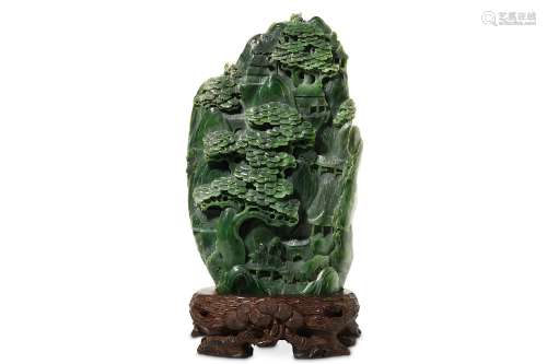 A CHINESE SPINACH JADE 'MOUNTAIN' CARVING. Carved to depict figures standing on a bridge above below