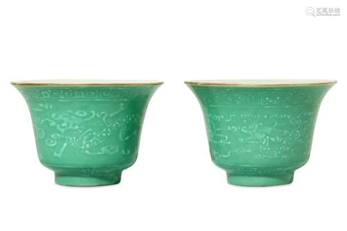 A PAIR OF CHINESE 'KUI' DRAGON CUPS. 20th Century. Each with a flared rim painted with archaistic
