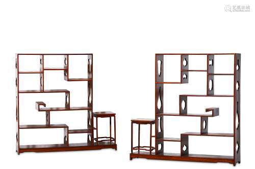 A PAIR OF CHINESE HARDWOOD DISPLAY SHELVES. 20th Century. With an arrangement of five levels of
