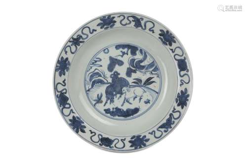 A CHINESE BLUE AND WHITE 'THREE RAMS' DISH. Ming Dynasty, Wanli period. Painted to the centre with