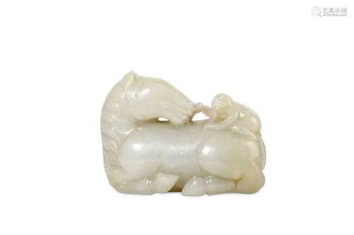 A CHINESE PALE CELADON JADE 'MONKEY AND HORSE' CARVING. Carved in the form of a recumbent horse, its