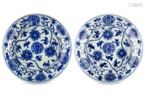 A PAIR OF CHINESE BLUE AND WHITE ‘LOTUS SCROLL’ DISHES. Six character Yongzheng mark and of the