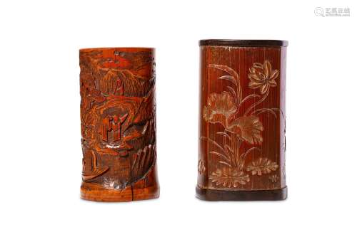 TWO CHINESE BAMBOO BRUSH POTS, BITONG. Qing Dynasty. One of cylindrical form carved to depict a