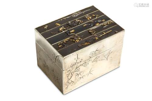 A SILVER BOX AND COVER. Meiji period. Of rectangular shape, the cover inset with five shakudo kozuka