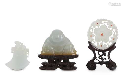 THREE CHINESE JADE CARVINGS.  19th/20th Century. Comprising: a pale celadon Budai He Shang, an