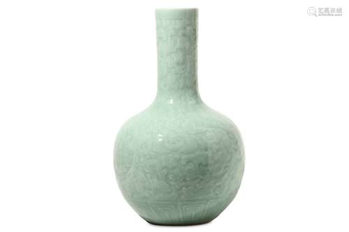 A CHINESE CELADON-GLAZED BOTTLE VASE. The ovoid body incised with stylised flower heads and