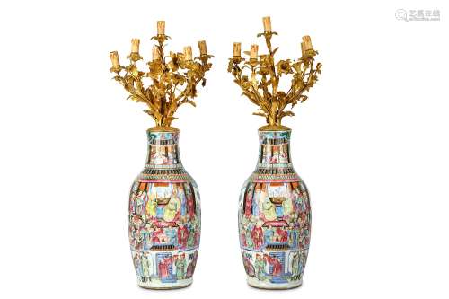 A PAIR OF CHINESE FAMILLE ROSE VASES. Qing Dynasty. Of reduced baluster form, decorated in bright