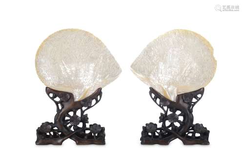 A PAIR OF CHINESE PEARL SHELL CARVINGS. Qing Dynasty, 19th Century. Carved in low relief with a