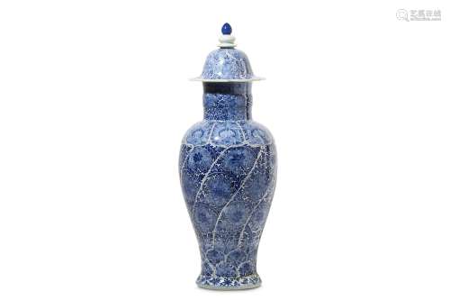 A CHINESE BLUE AND WHITE VASE AND COVER. Qing Dynasty Kangxi period. The tapered ovoid body