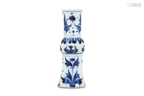 A CHINESE BLUE AND WHITE VASE. Transitional period, circa 1640. With a tall flared foot and neck and
