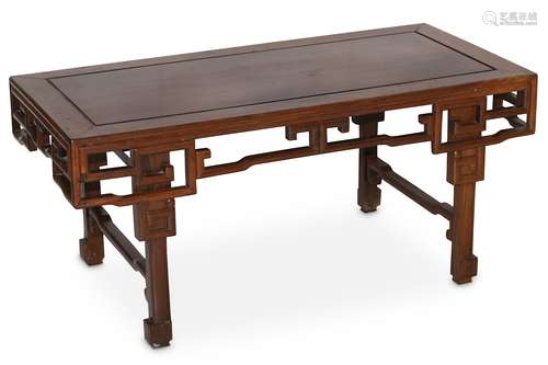 A CHINESE WOOD LOW TABLE. Late Qing Dynasty. With a rectangular top and a reticulated apron carved