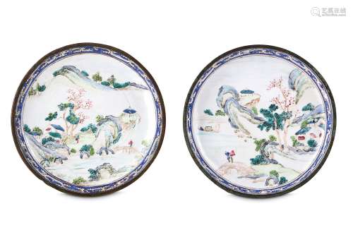 A PAIR OF CHINESE CANTON ENAMEL 'LANDSCAPE' SAUCERS. Qing Dynasty, 18th Century. Each painted with