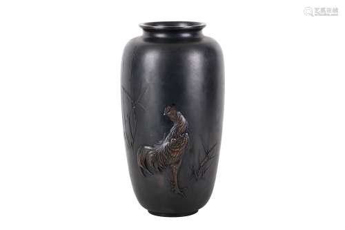 A LARGE BRONZE VASE. Meiji period. Worked in high relief with a shamo (fighting fowl) beside bamboo,