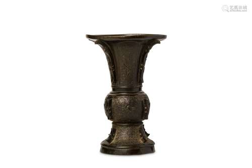 A CHINESE BRONZE ARCHAISTIC VASE, GU. Yuan Dynasty. The hexagonal body cast with a globular mid-