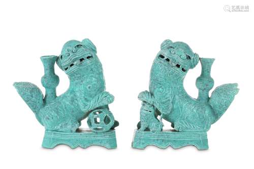 A PAIR OF CHINESE ROBIN'S EGG GLAZED LION DOG JOSS STICK HOLDERS. Qing Dynasty, 19th Century. The