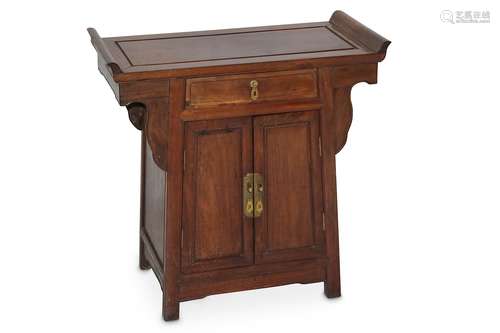 A CHINESE WOOD CABINET. Late Qing Dynasty. With a single drawer above a pair of panel doors, the