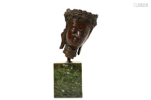 A BRONZE HEAD. Probably Sukathai period. Cast with a serene expression to the face with downcast