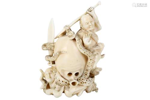 AN IVORY OKIMONO OF AN OCTOPUS AND FISHERMEN. Meiji Period. Two fishermen, each carrying an oar,