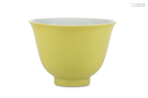 A CHINESE LEMON YELLOW-GLAZED CUP.  Qing Dynasty, 18th Century. With a tall flared body raised on
