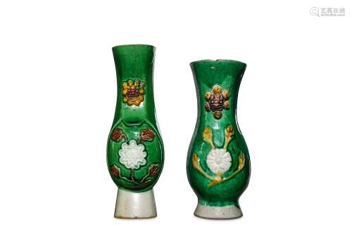 A PAIR OF CHINESE WUCAI WALL VASES. 17th Century. Moulded to depict a floral spray below a lion head