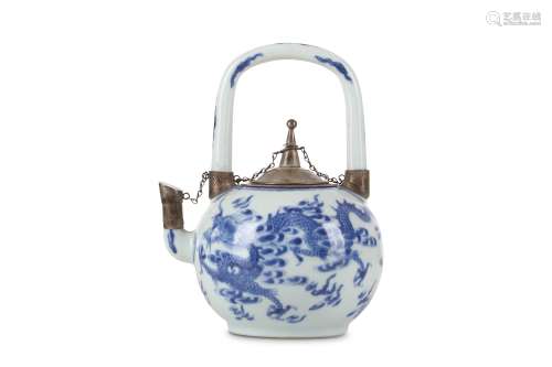 A CHINESE BLUE AND WHITE 'DRAGON' TEAPOT AND COVER. Qing Dynasty, 18th Century. The ovoid body