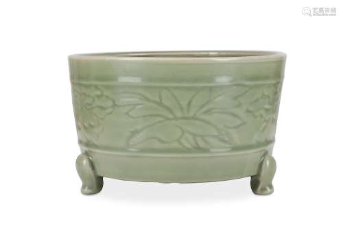 A CHINESE CELADON-GLAZED INCENSE BURNER. Ming Dynasty. The cylindrical, slightly tapered body