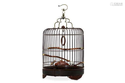 A CHINESE BAMBOO BIRD CAGE. Late Qing Dynasty. With a solid bamboo floor, furnished with three