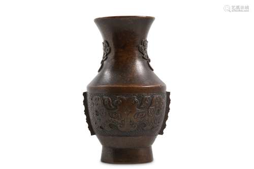 A CHINESE BRONZE VASE. Qing Dynasty, 18th Century. Of baluster form, with the rounded body supported