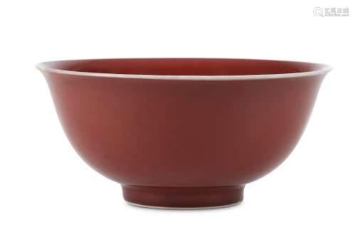 A CHINESE COPPER-RED GLAZED BOWL.  Qing Dynasty, Kangxi mark and of the period. The S-shaped body