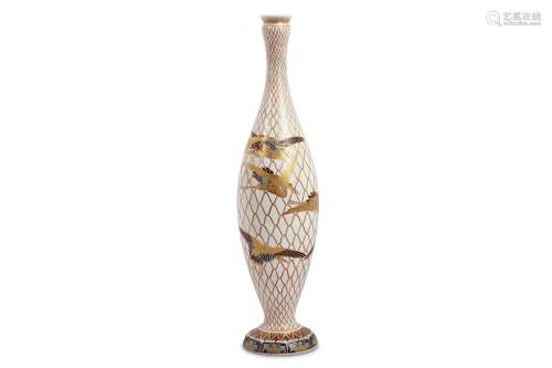 A SATSUMA VASE. Meiji period. Of a slender body and flared neck and foot, decorated in various