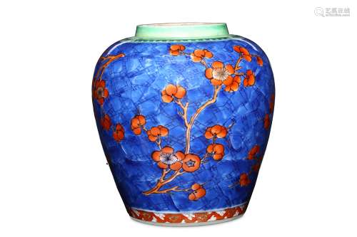 A CHINESE CLOBBERED BLUE AND WHITE 'PRUNUS' JAR. Qing Dynasty, Kangxi period. The ovoid, slightly