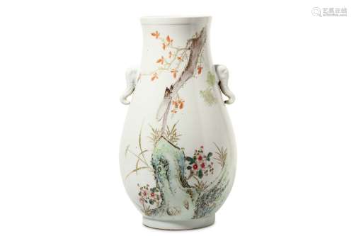 A CHINESE FAMILLE ROSE VASE. Of hu form, painted with a cicada on a blossoming magnolia branch