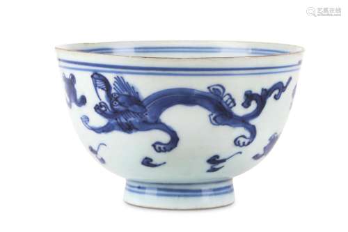 A CHINESE BLUE AND WHITE 'DRAGON' BOWL.  Late Ming Dynasty.   With a gently flared body painted with