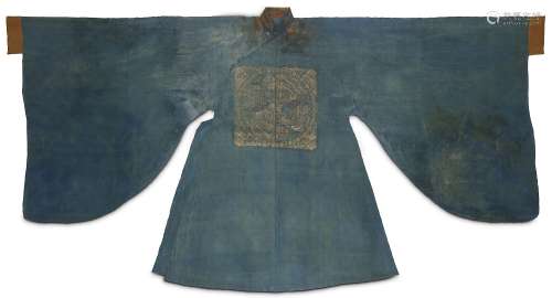 A CHINESE BLUE SILK ROBE. Yuan to early Ming Dynasty. The gown with a rank badge to the centre woven